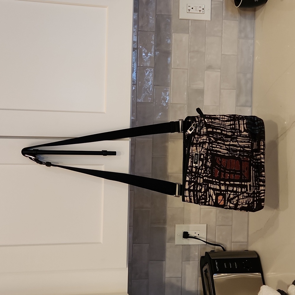 Tumi Cross Body